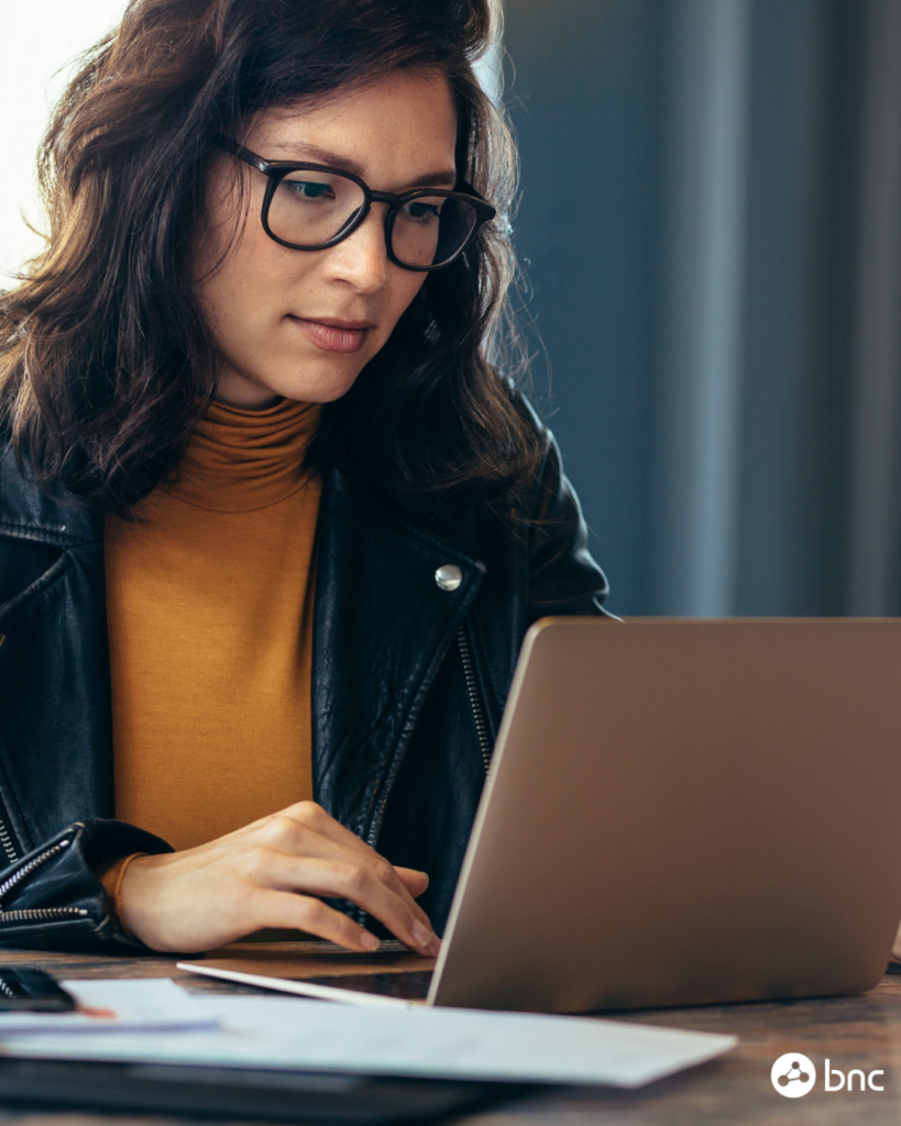 female working on secure laptop